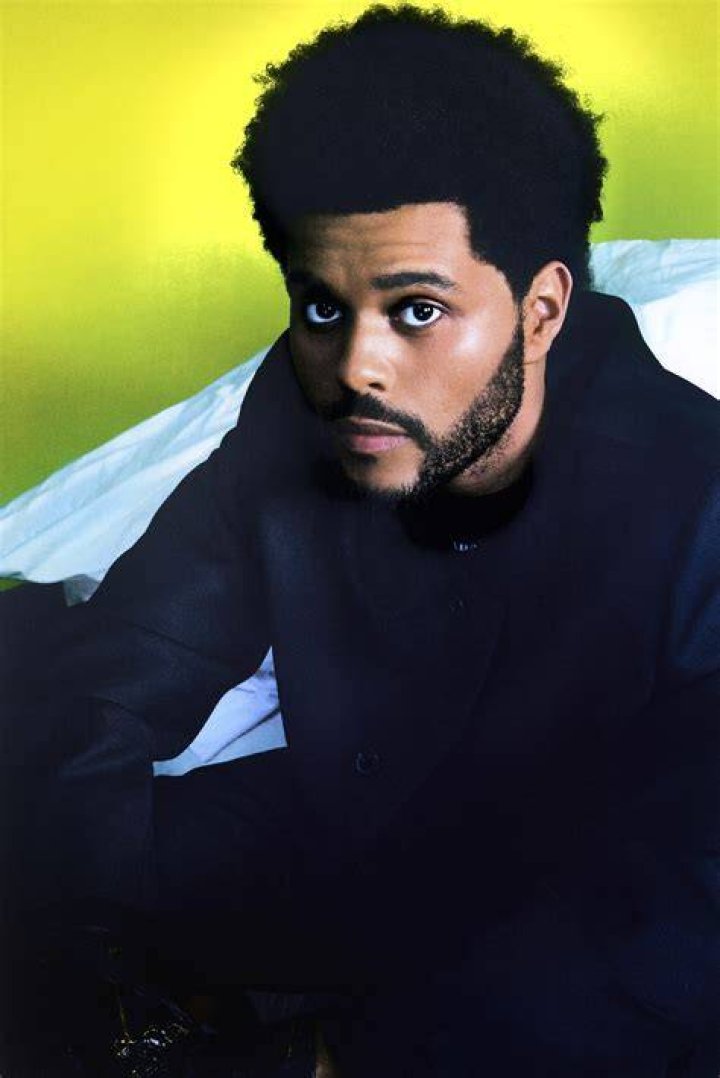 abel The Weeknd and I think his son the caption to it was "baby boy
