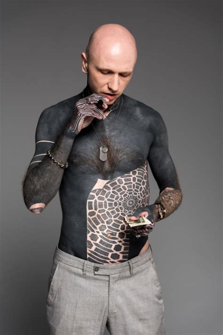 Artistic Expressions: Exploring The Darkness Of Blackout Tattoos