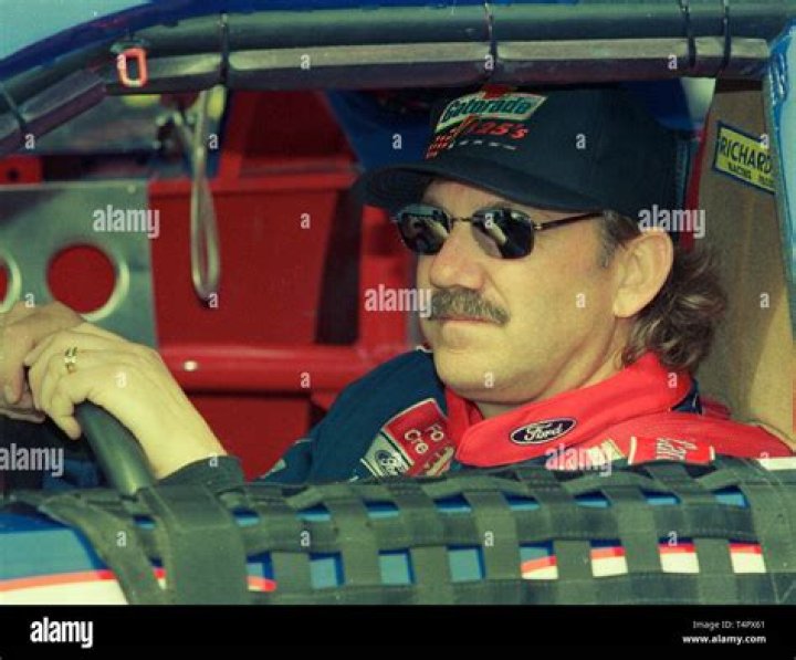 Dale Jarrett on pit road with his wife at Darlington Raceway at the