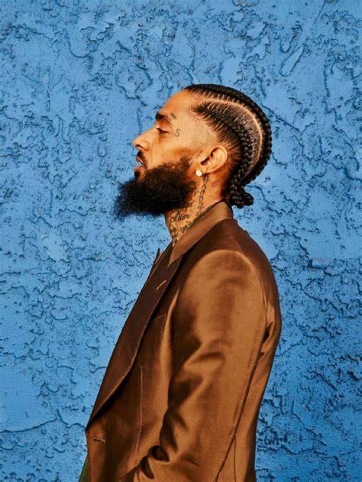 Image of Nipsey Hussle with his wife Lauren London